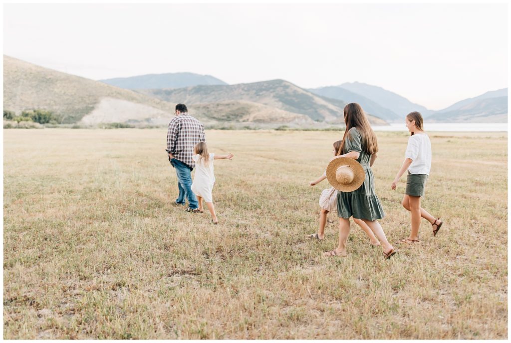 End of Family Session in Midway, Utah in a gorgeous open field during golden hour. 
