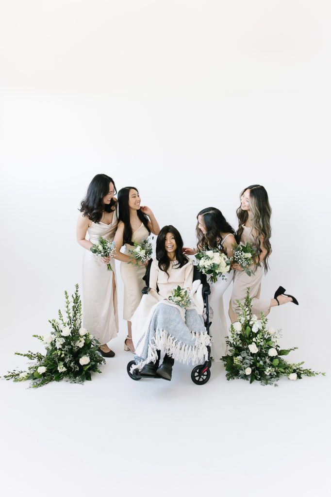 Bridesmaids all laugh together as they celebrate this special day! Bridesmaid in a wheelchair as she is battling cancer diagnosis. #KaileeMatsumuraPhotography #KaileeMatsumuraWeddings #Studiowedding #UtahWedding #SLCwedding #SLCweddingphotographer
#WeddingphotographerinSLC