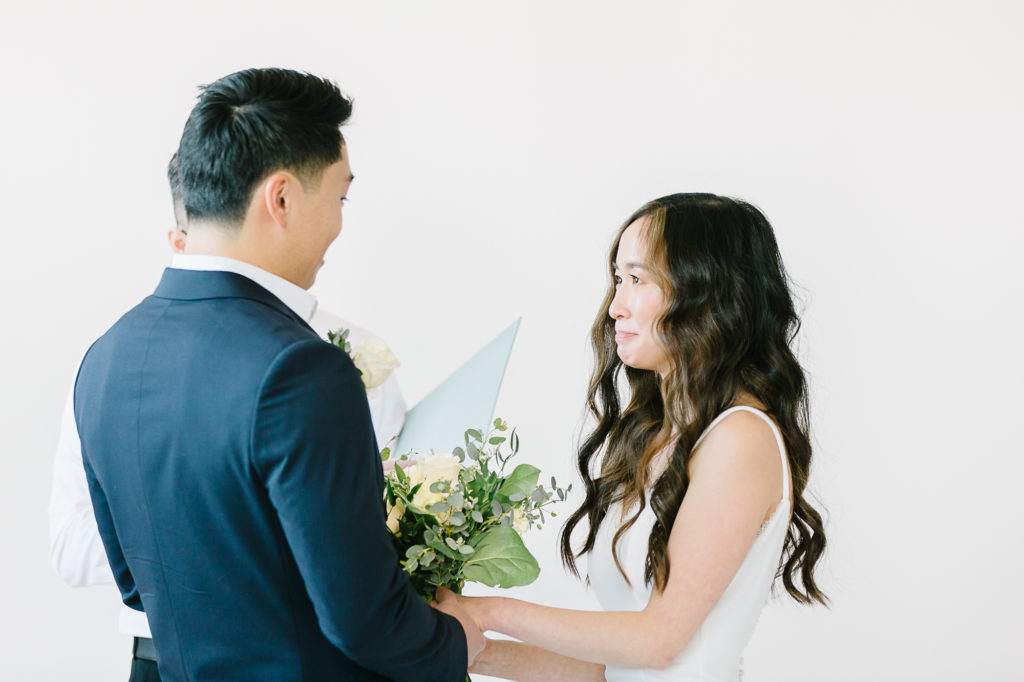 Bride tearing up while listening to the Groom say his vows. #KaileeMatsumuraPhotography #KaileeMatsumuraWeddings #Studiowedding #UtahWedding #SLCwedding #SLCweddingphotographer
#WeddingphotographerinSLC