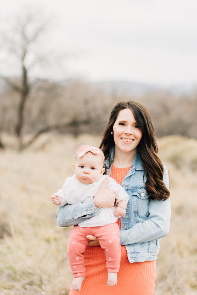 The sweetest mom holds her baby on her hip. Mom and daughter match in coral colored dress and darling leggings. Jean jacket outfit inspiration. Germantown family photographer
#KaileeMatsumuraPhotography #MeaningfulFamilyPhotoSessions #TennesseeFamilyPhotographer

