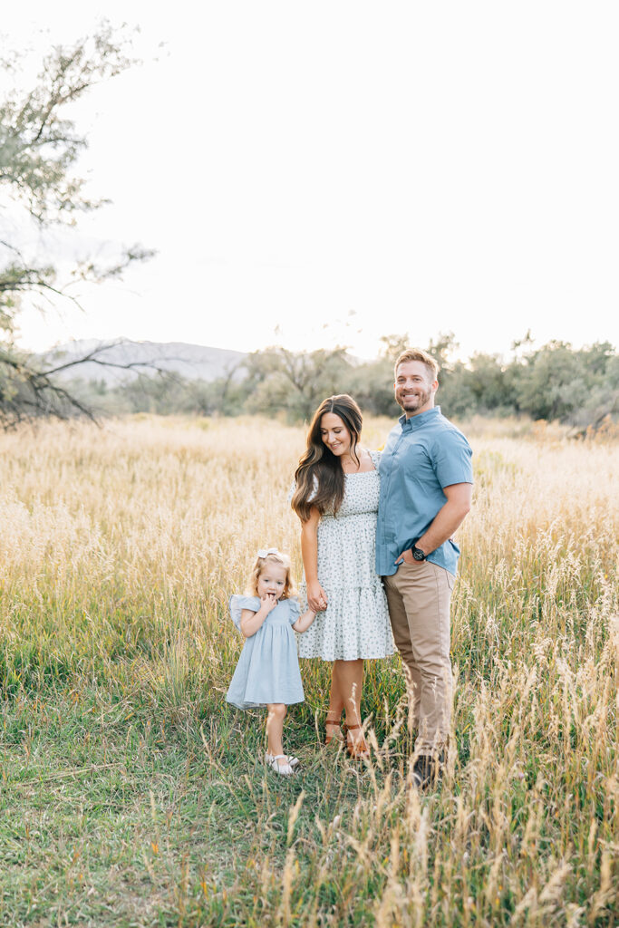 Family poses for an outdoor photoshoot; everyone is relaxed and natural, which is a perfect combination for the family photos you envisioned. Family photo tips tricks outdoor vision mom dad toddler kids outfit inspiration #outdoorfamilyphotography #Tennessefamilyphotographer #mississippifamilyphotographer #tipsforsummerfamilyphotos



