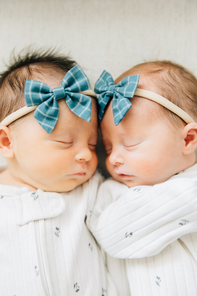 close up photo of twin girls during their photo session with Kailee Matsumura Photography, a Germantown Newborn Photographer. 