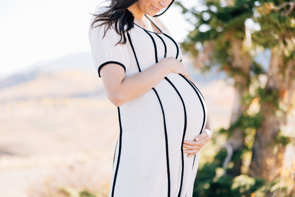 Mother during maternity photos. Memphis Maternity Photographer Kailee Matsumura.