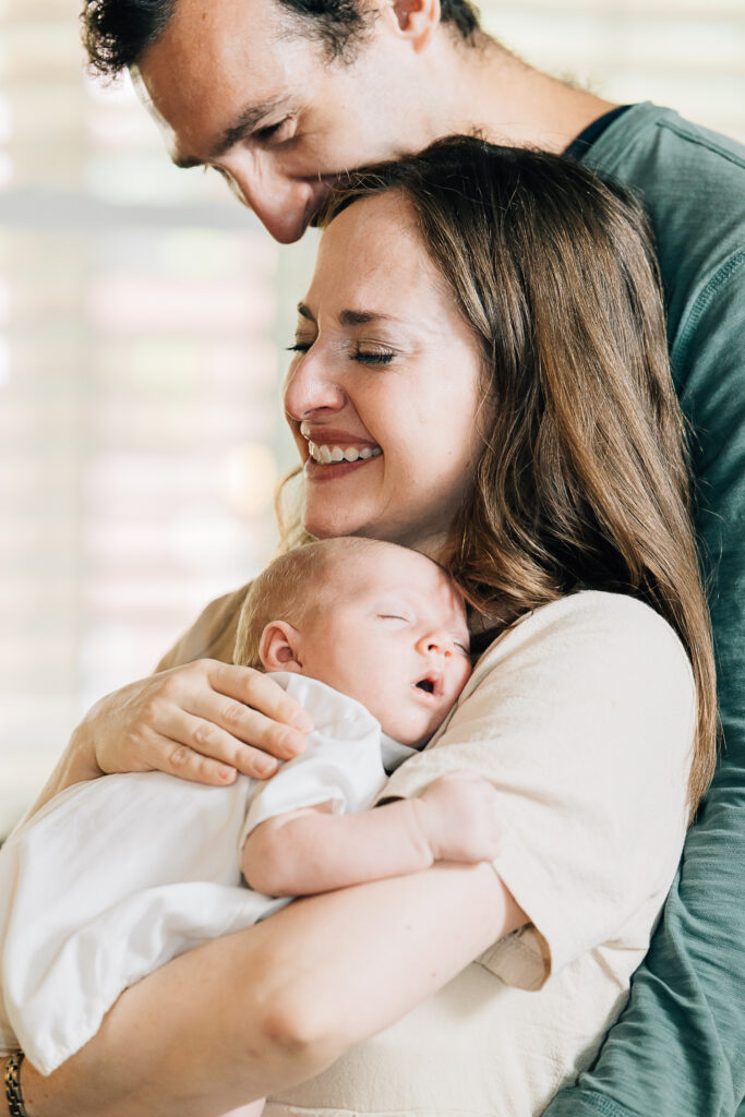 Emotional In home newborn session. 